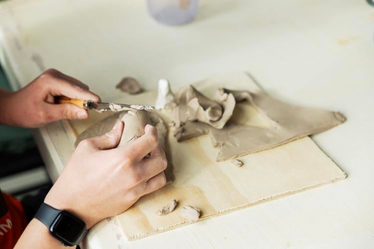 Neurodivergent students learn ceramics in art workshop
